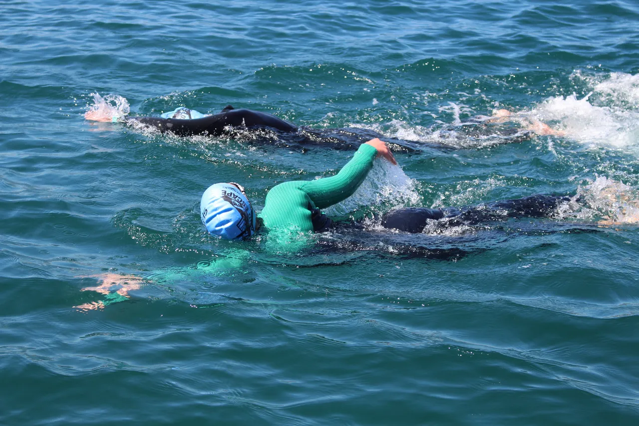 Swim for the win! leigh and talitha complete robben island swim for great causes