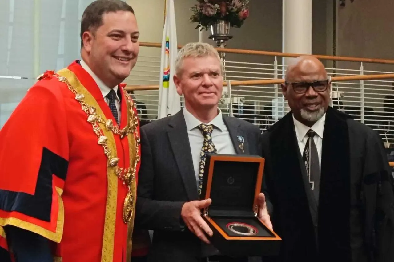 Michael Farquhar receives Mayors Medal