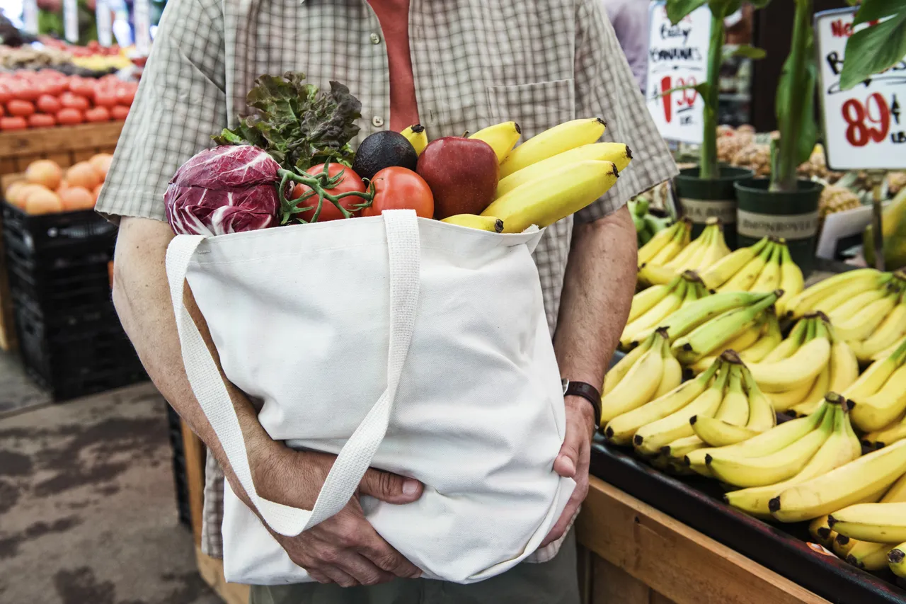 Close up of person at a food and vegetable market 2025 04 05 05 21 35 utc